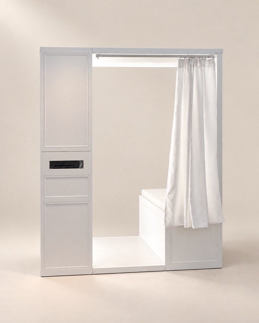 The enclosed booth in a neutral studio setting