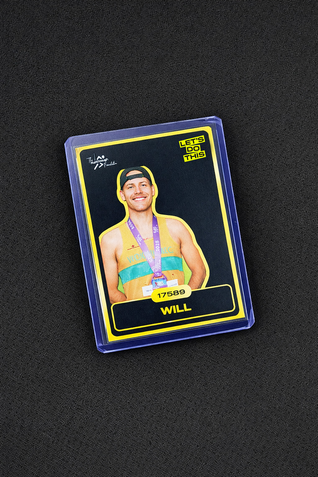 A personalised Let’s Do This runner trading card
