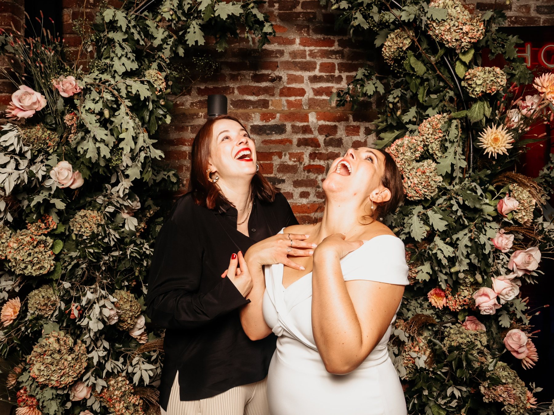 Guests in the photo booth at the wedding of Antonia & Nick