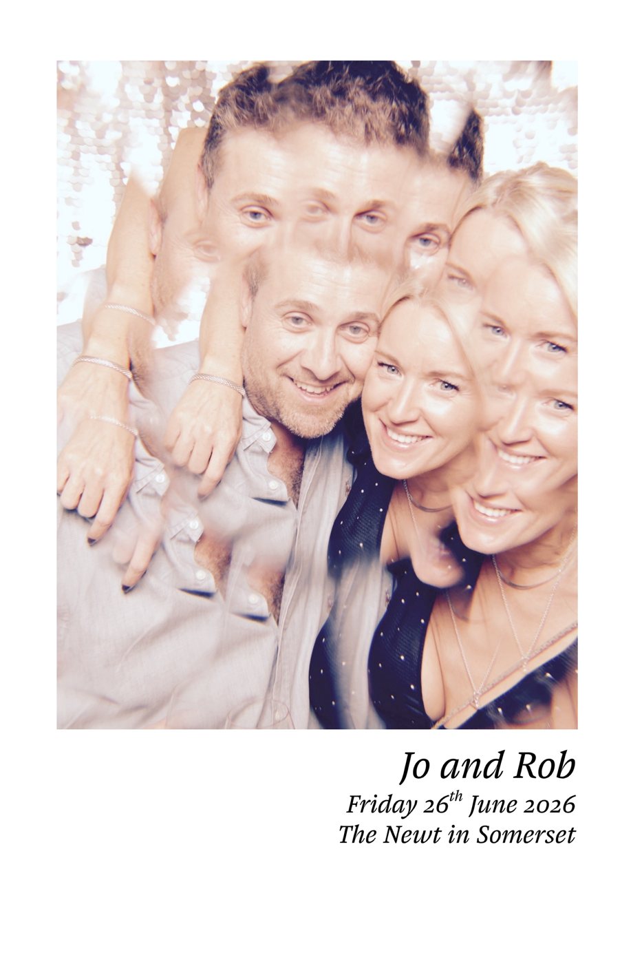 Guests in the kaleidoscope photo booth at the wedding of Jo & Rob