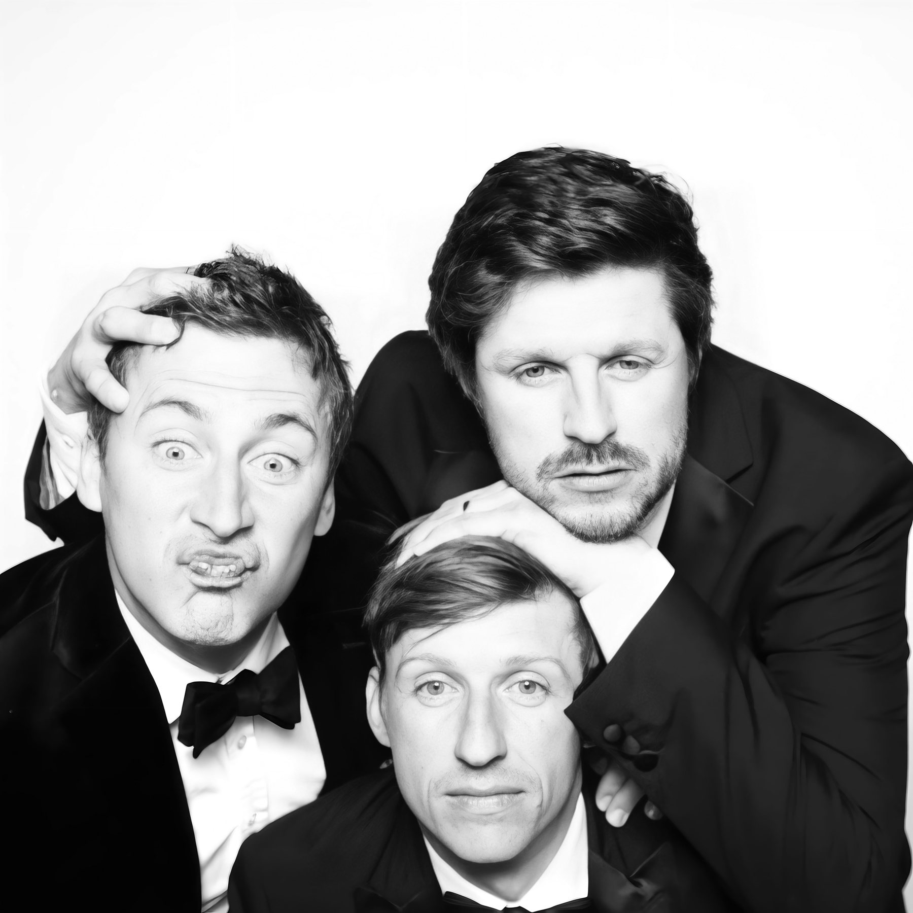 Guests at a wedding photo booth